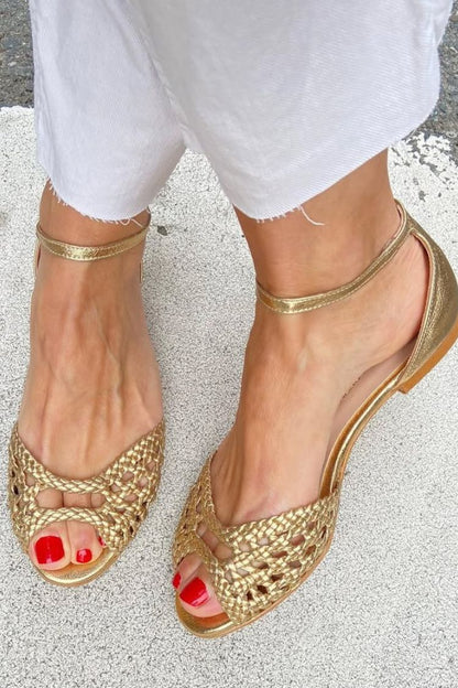 Sandalias trenzadas doradas Isabel