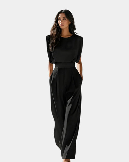 Mono elegante con cinturón Jazmín